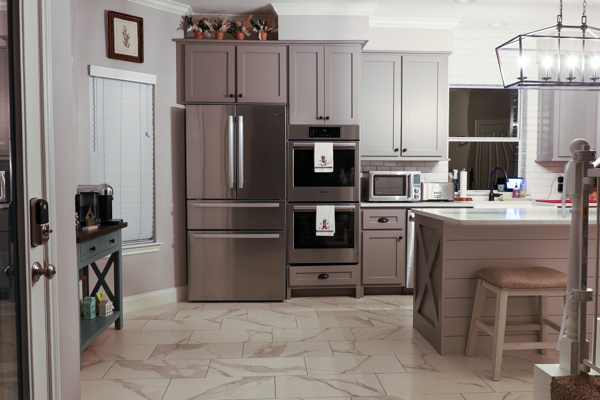 19 Feather Fall Place The Woodlands, TX 77381 - Photo 8 of 20 a kitchen with stainless steel appliances a refrigerator stove and microwave