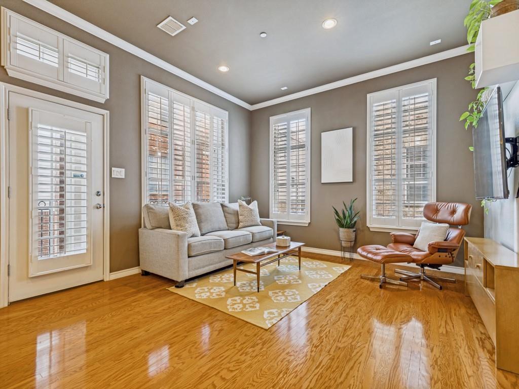 15741 Seabolt Place, Unit 28 Addison, TX 75001 - Photo 6 of 37 Living room with ornamental molding, light wood finished floors, and recessed lighting