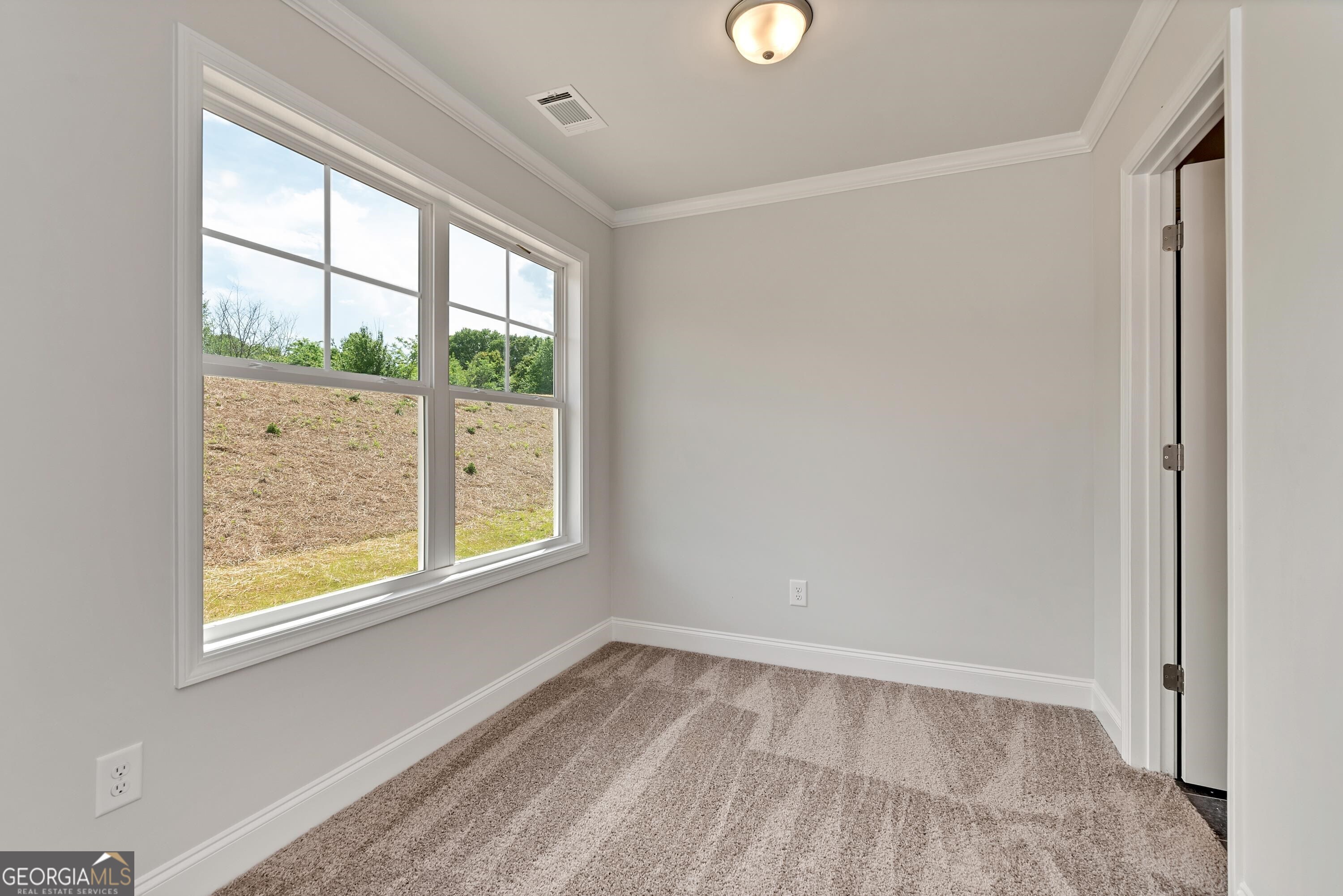 439 Equestrian Walk Winder, GA 30680 - Photo 16 of 33 an empty room with a window