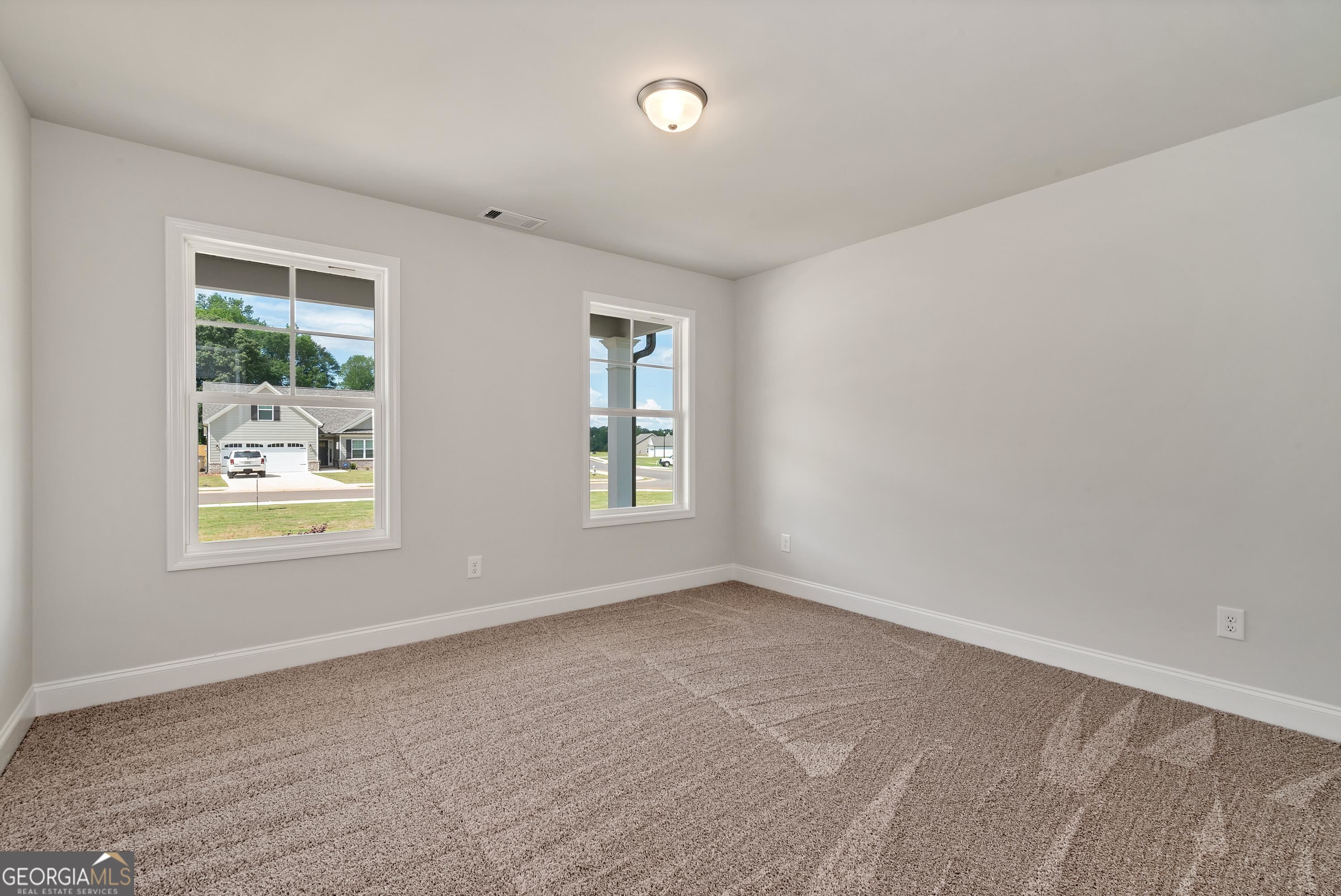 439 Equestrian Walk Winder, GA 30680 - Photo 25 of 33 a view of an empty room with a window