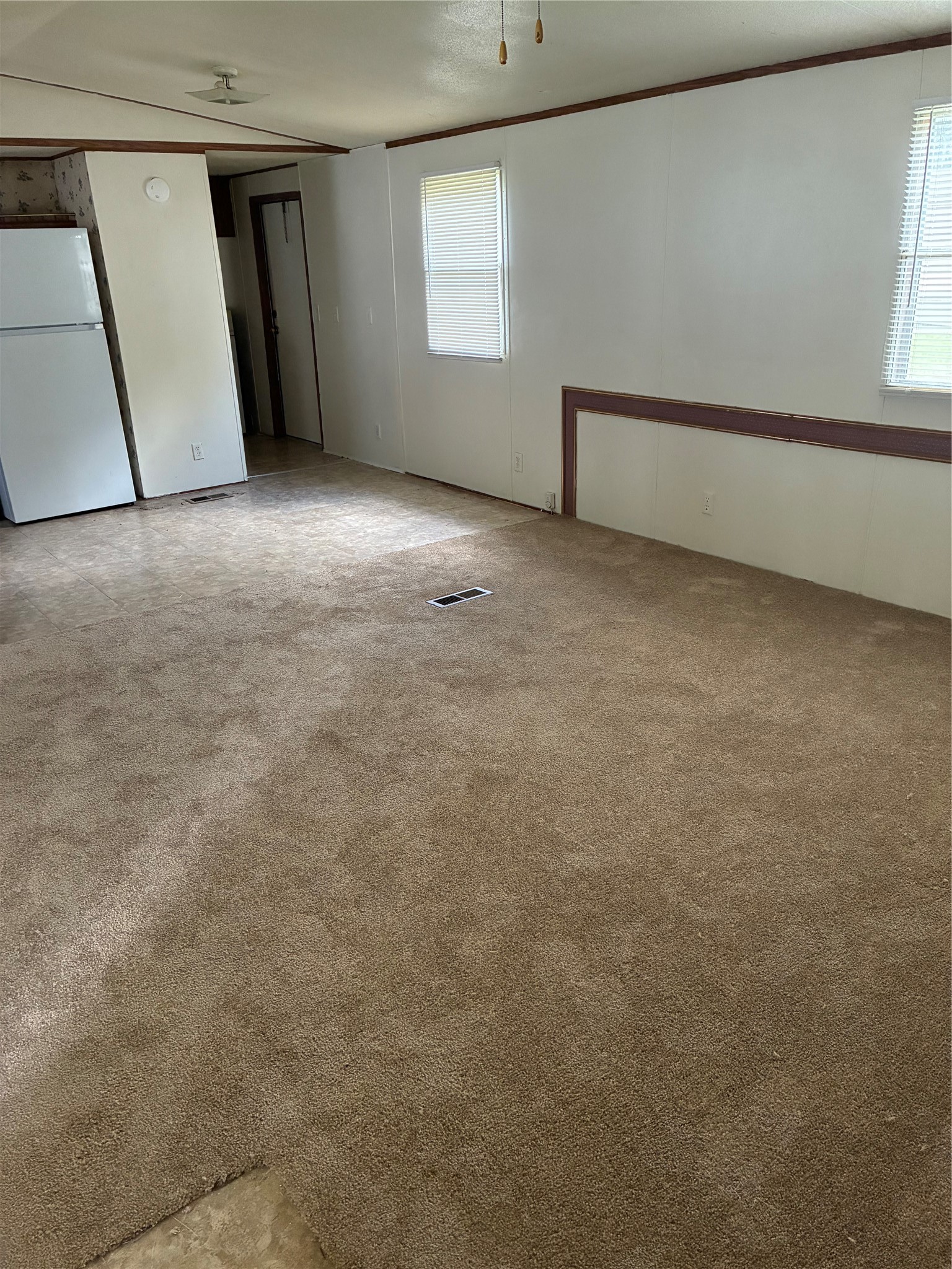 3410 Old Houston Road, Unit B Huntsville, TX 77340 - Photo 4 of 7 a view of an empty room with a window