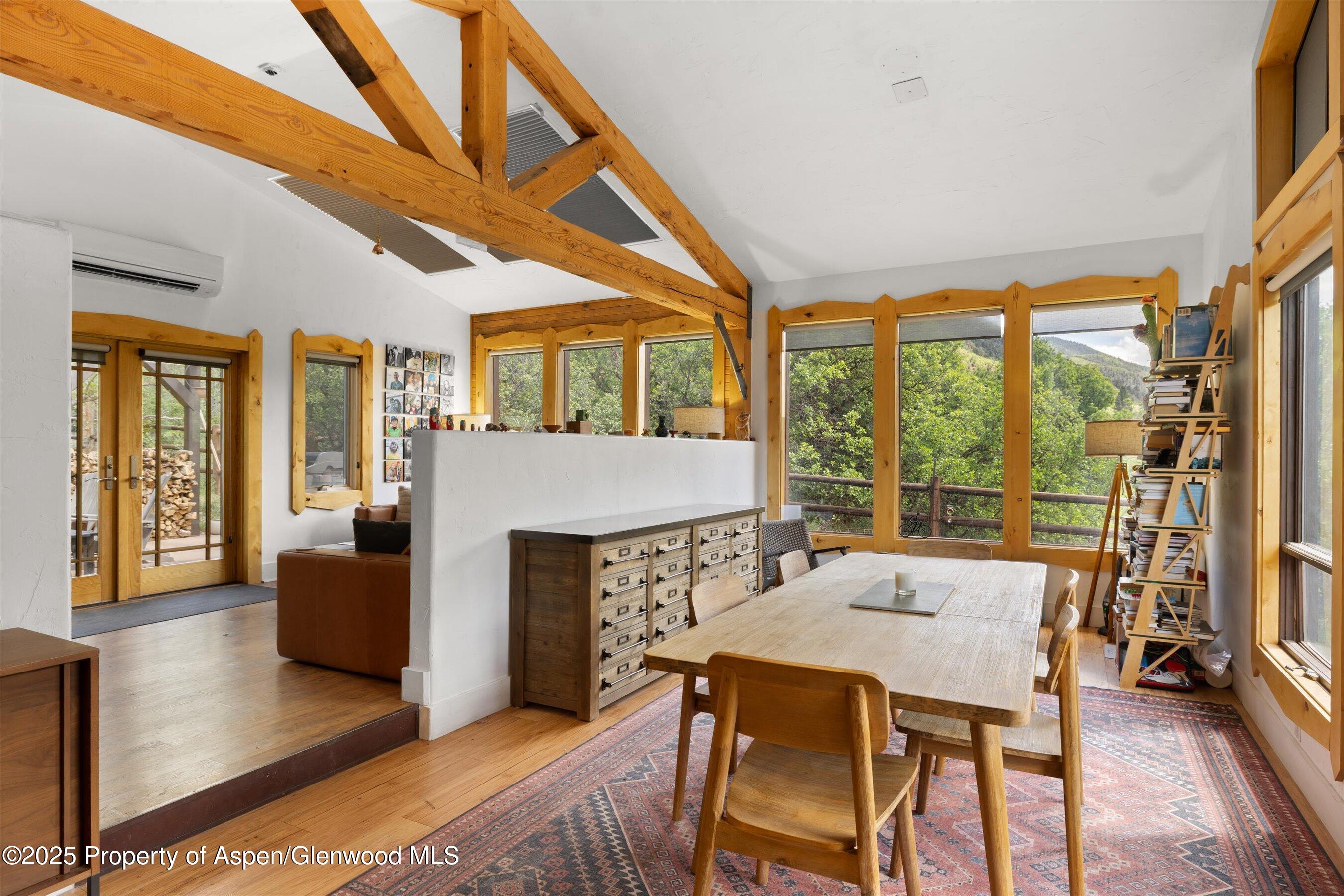 116 South Bill Creek Road Carbondale, CO 81623 - Photo 2 of 45 a living room with furniture and a fireplace