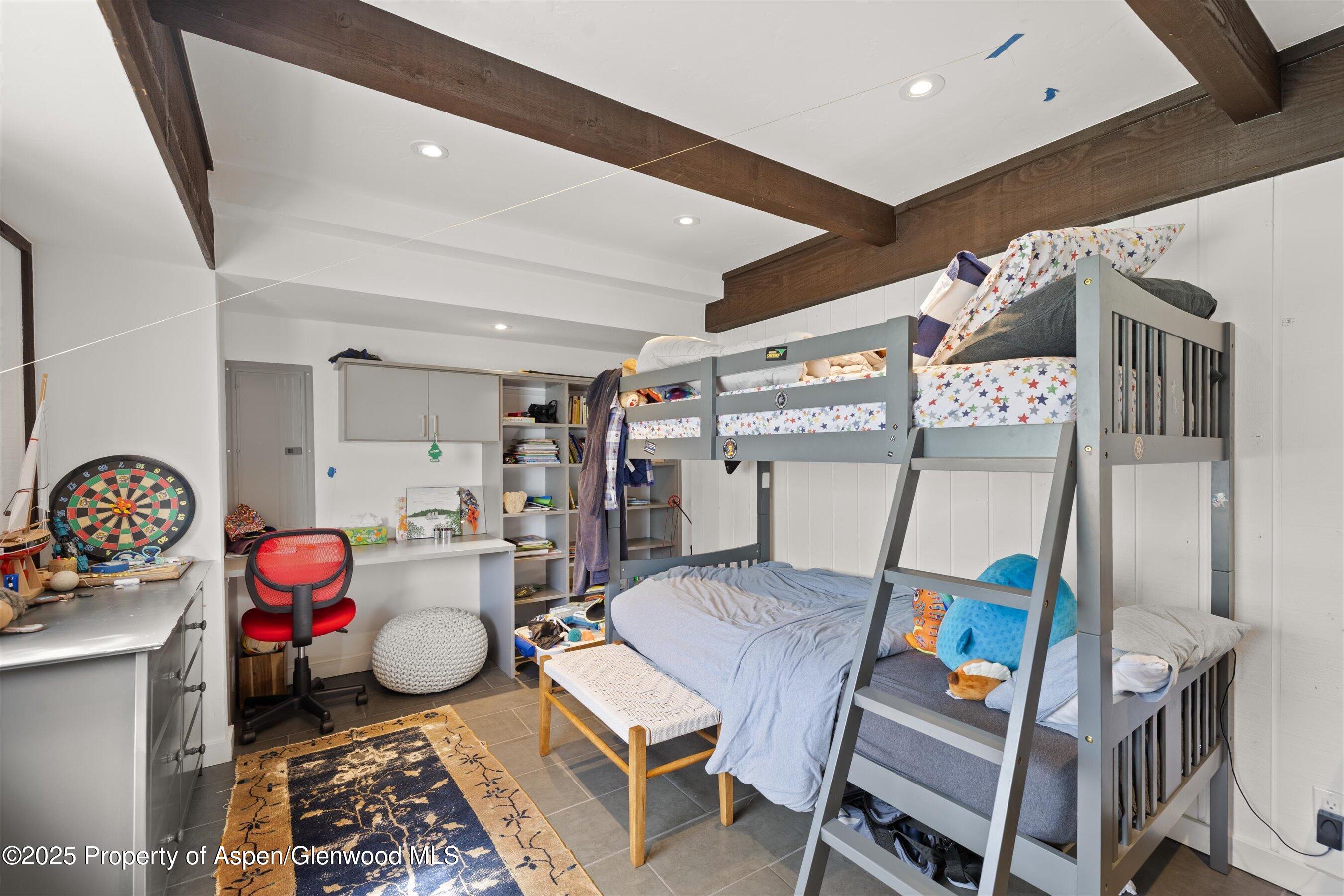 116 South Bill Creek Road Carbondale, CO 81623 - Photo 30 of 45 a living room with furniture a rug and a table
