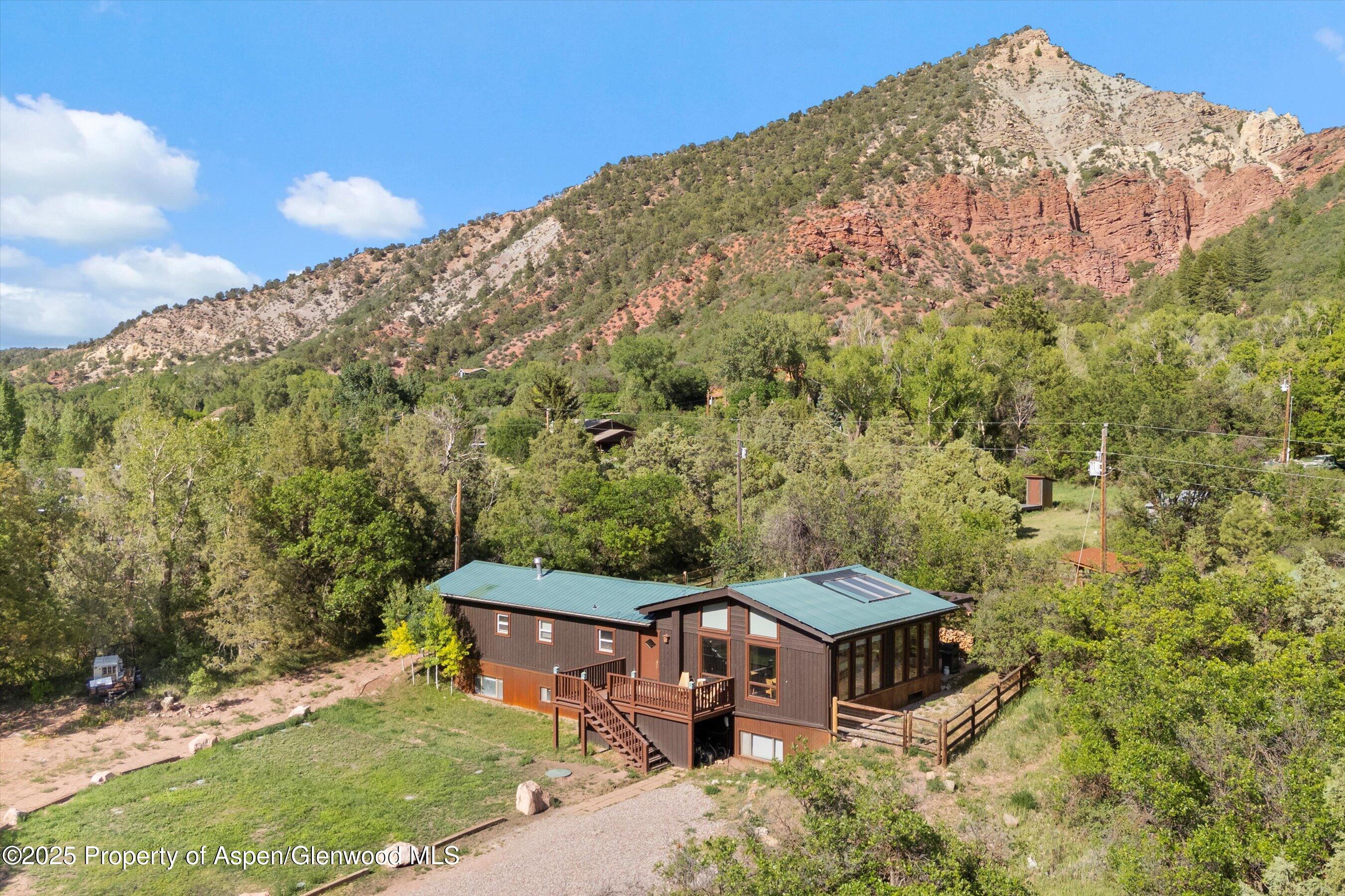 116 South Bill Creek Road Carbondale, CO 81623 - Photo 5 of 45 a front view of a house with a yard