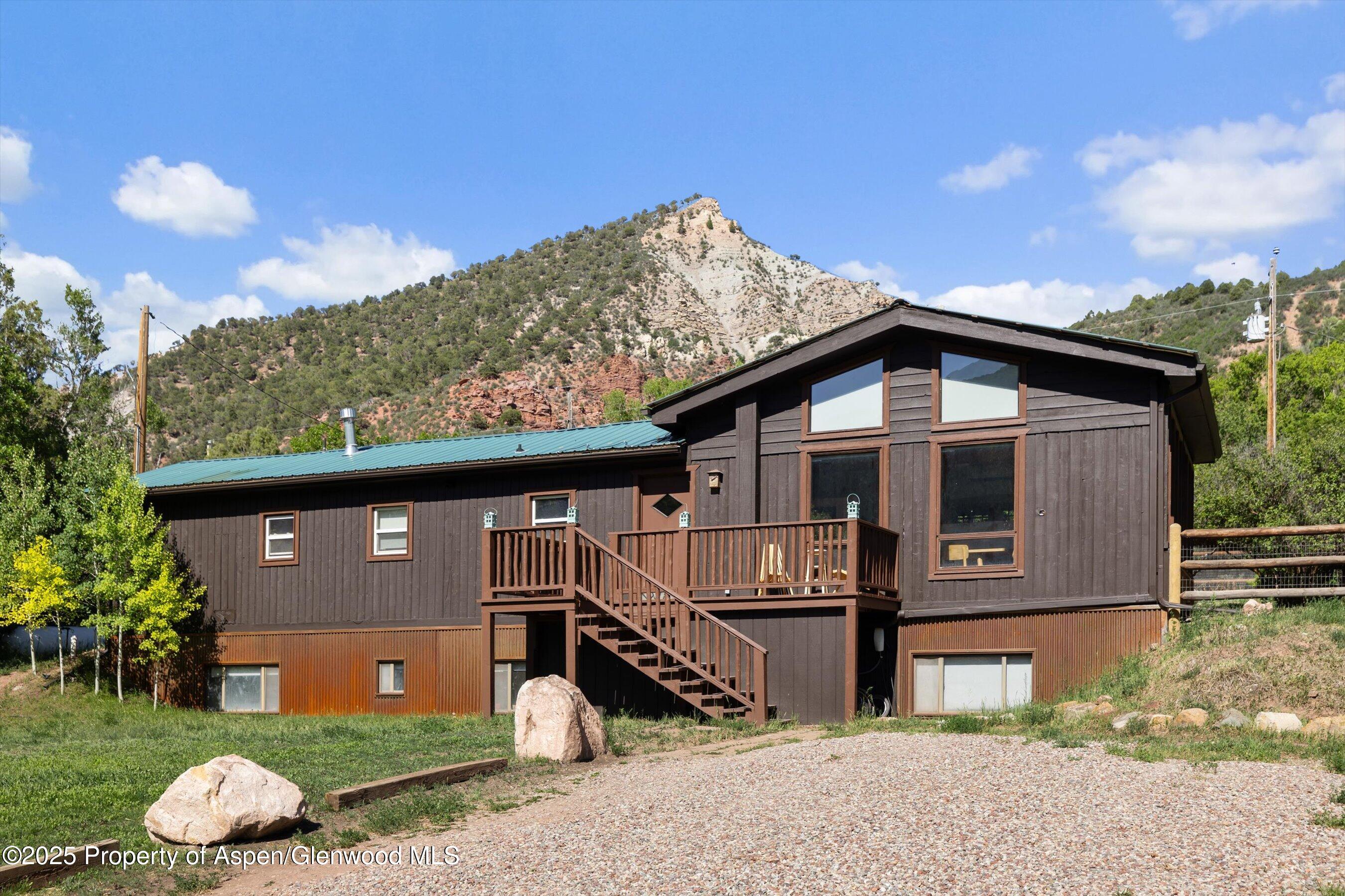 116 South Bill Creek Road Carbondale, CO 81623 - Photo 6 of 45 a front view of a house with a yard