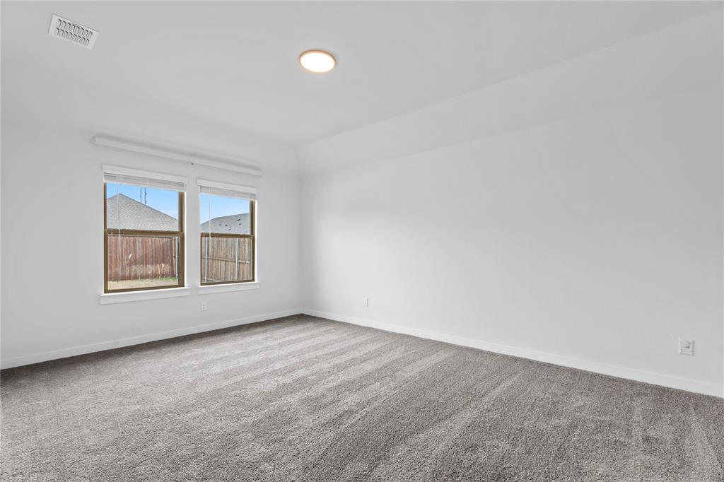 718 Parkside Drive Lavon, TX 75166 - Photo 10 of 22 Unfurnished room with carpet floors and baseboards