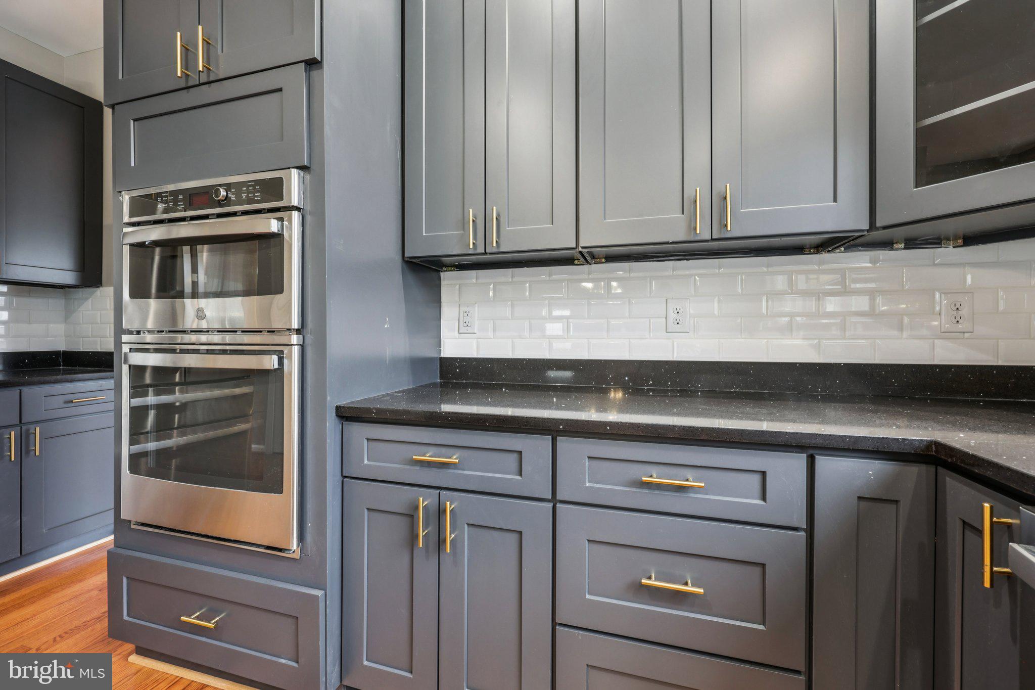 15730 Marbury Heights Way Montclair, VA 22025 - Photo 16 of 69 a kitchen with granite countertop stainless steel appliances and cabinets