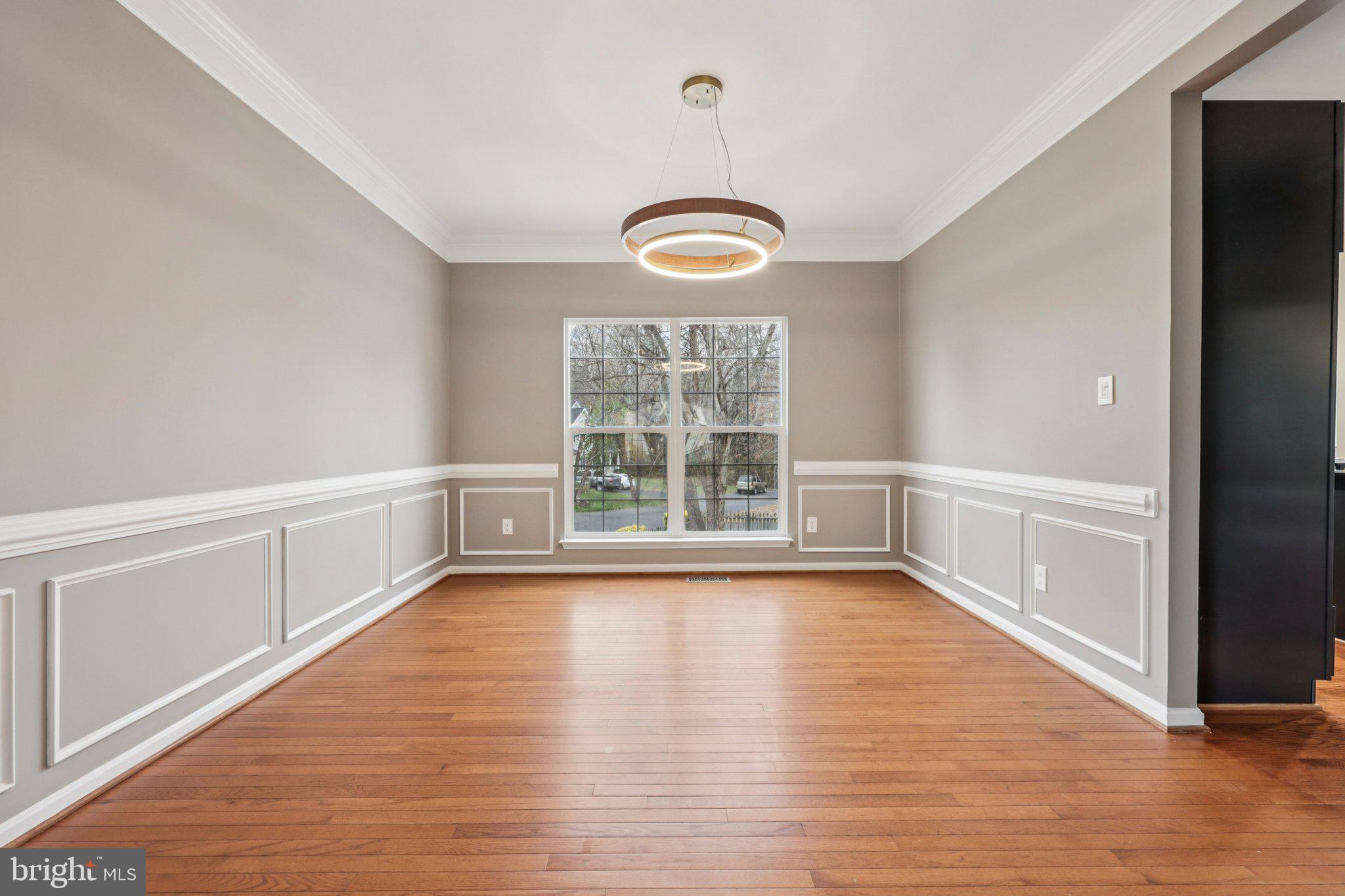 15730 Marbury Heights Way Montclair, VA 22025 - Photo 20 of 69 a view of a room with wooden floor and window