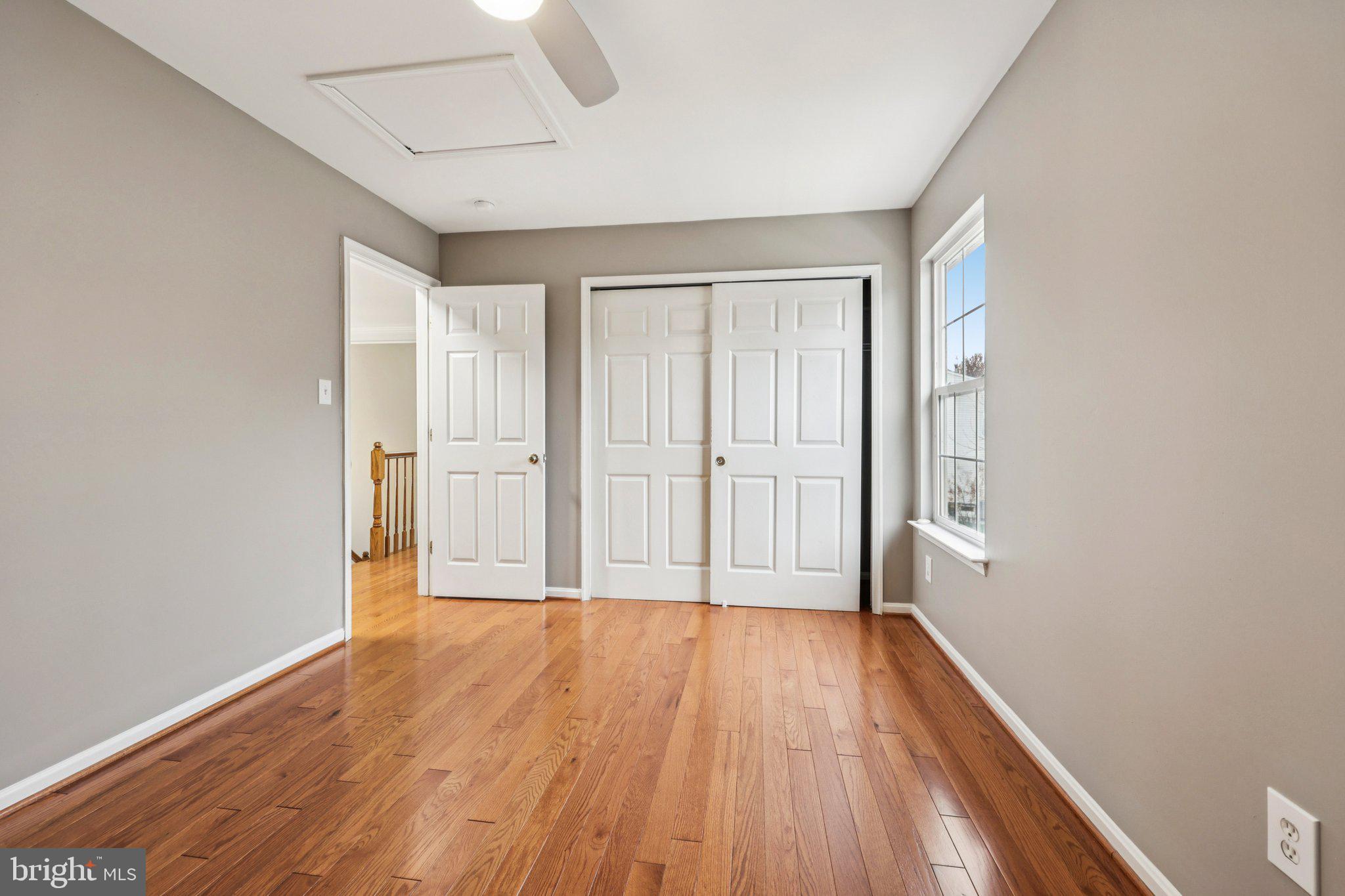 15730 Marbury Heights Way Montclair, VA 22025 - Photo 40 of 69 a view of an empty room with wooden floor