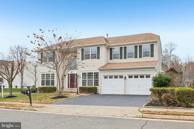 a front view of a building with garden