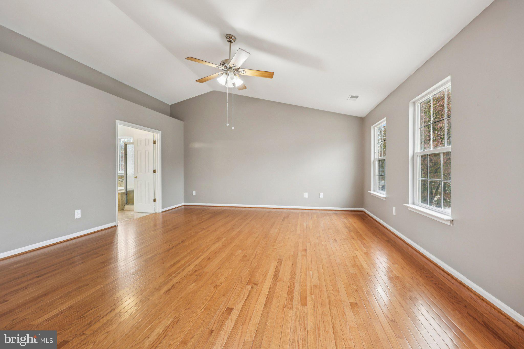 15730 Marbury Heights Way Montclair, VA 22025 - Photo 44 of 69 wooden floor in an empty room with a window