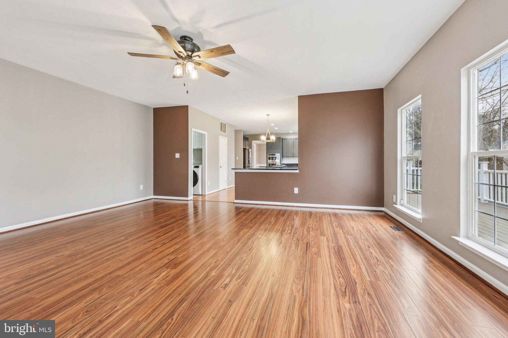 15730 Marbury Heights Way Montclair, VA 22025 - Photo 9 of 69 wooden floor in an empty room with a window