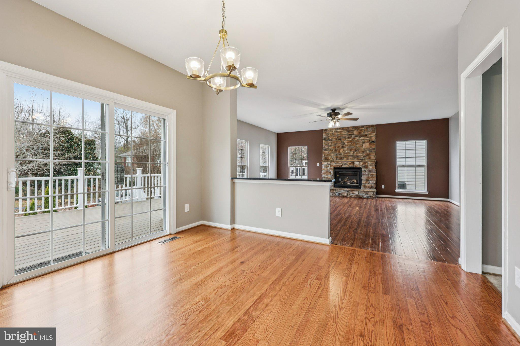15730 Marbury Heights Way Montclair, VA 22025 - Photo 10 of 69 a view of a room with wooden floor and staircase