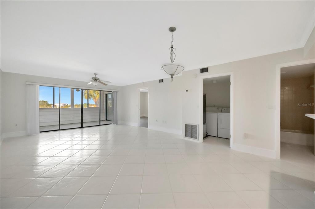 9604 Cortez Road West, Unit 222 Bradenton, FL 34210 - Photo 20 of 54 a view of a kitchen with refrigerator and windows