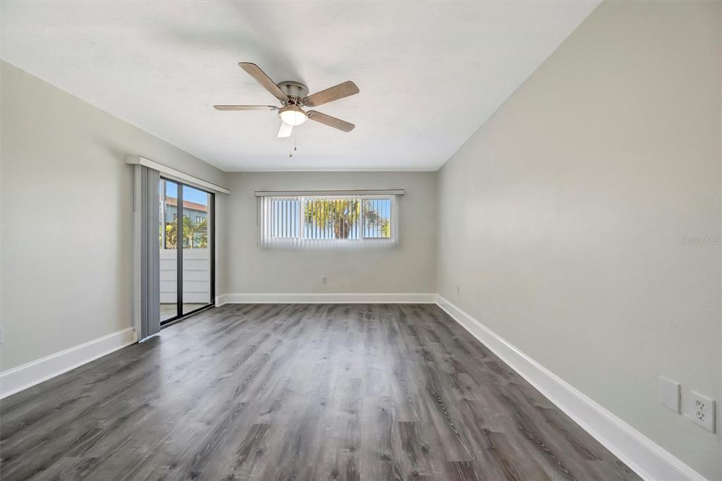 9604 Cortez Road West, Unit 222 Bradenton, FL 34210 - Photo 40 of 54 wooden floor in an empty room with a window