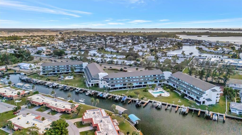 9604 Cortez Road West, Unit 222 Bradenton, FL 34210 - Photo 51 of 54 an aerial view of a city with a lake