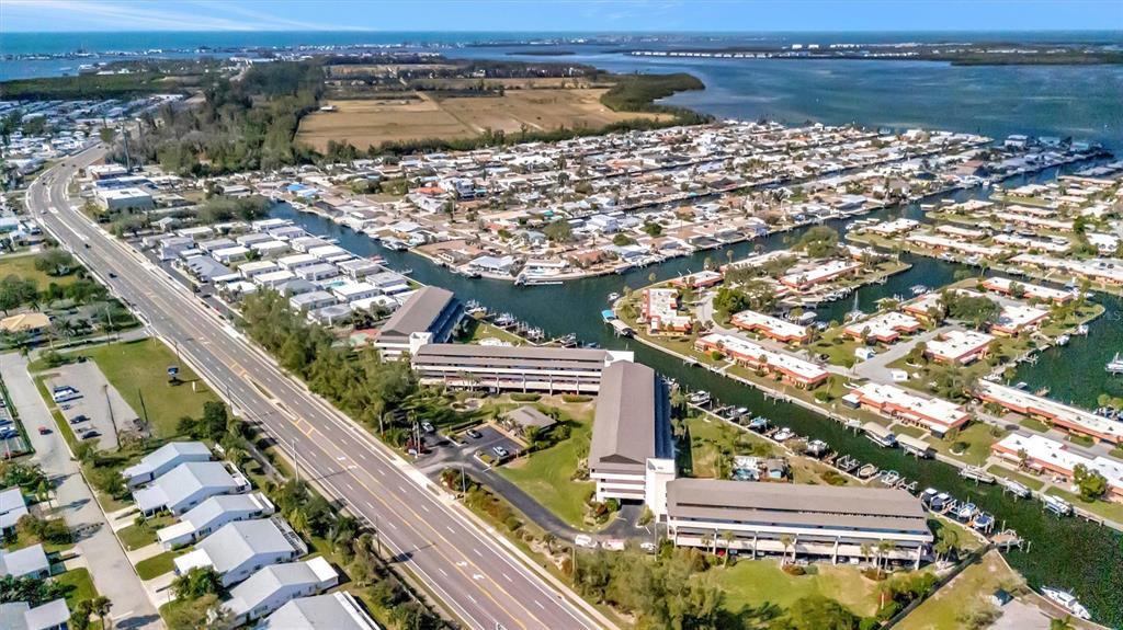 9604 Cortez Road West, Unit 222 Bradenton, FL 34210 - Photo 54 of 54 a view of a lake with a city skyline