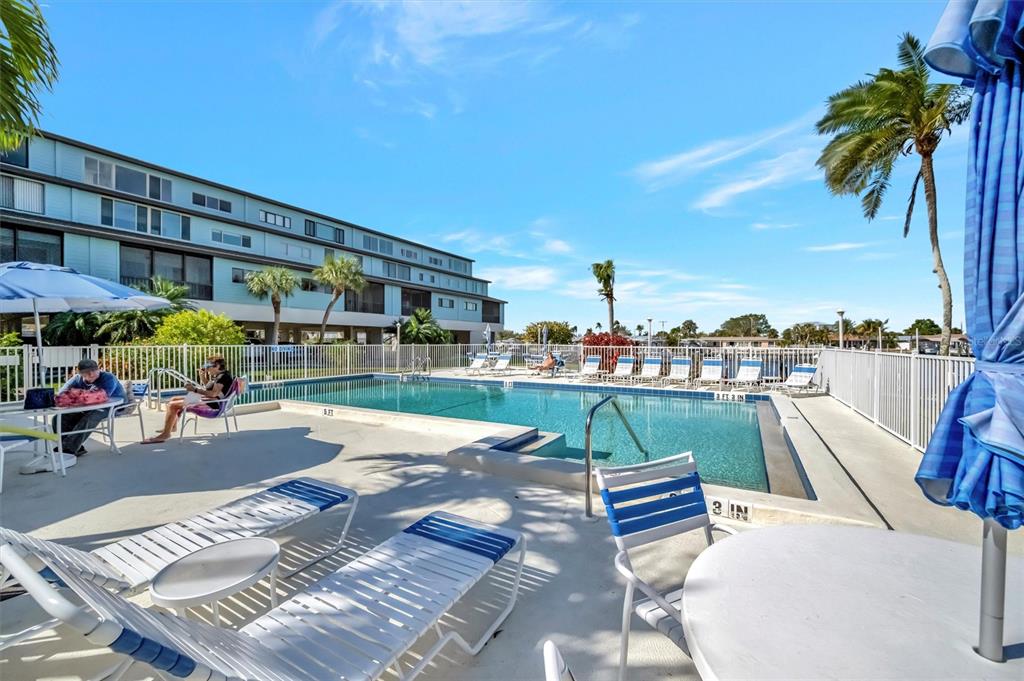 9604 Cortez Road West, Unit 222 Bradenton, FL 34210 - Photo 6 of 54 a view of a patio with swimming pool