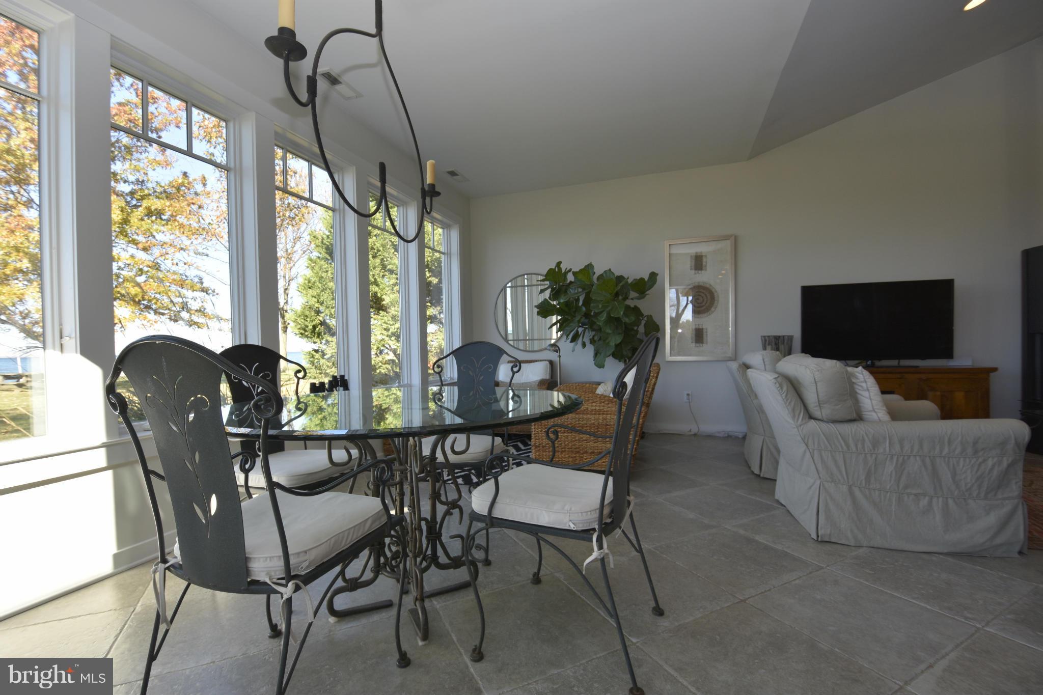 6050 Sunset Lane Tilghman, MD 21671 - Photo 16 of 74 a view of a livingroom with furniture and windows