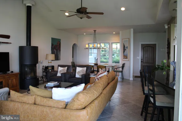 a bedroom with a bed furniture and a window