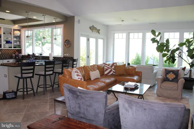 a bedroom with a bed and a lamp on table