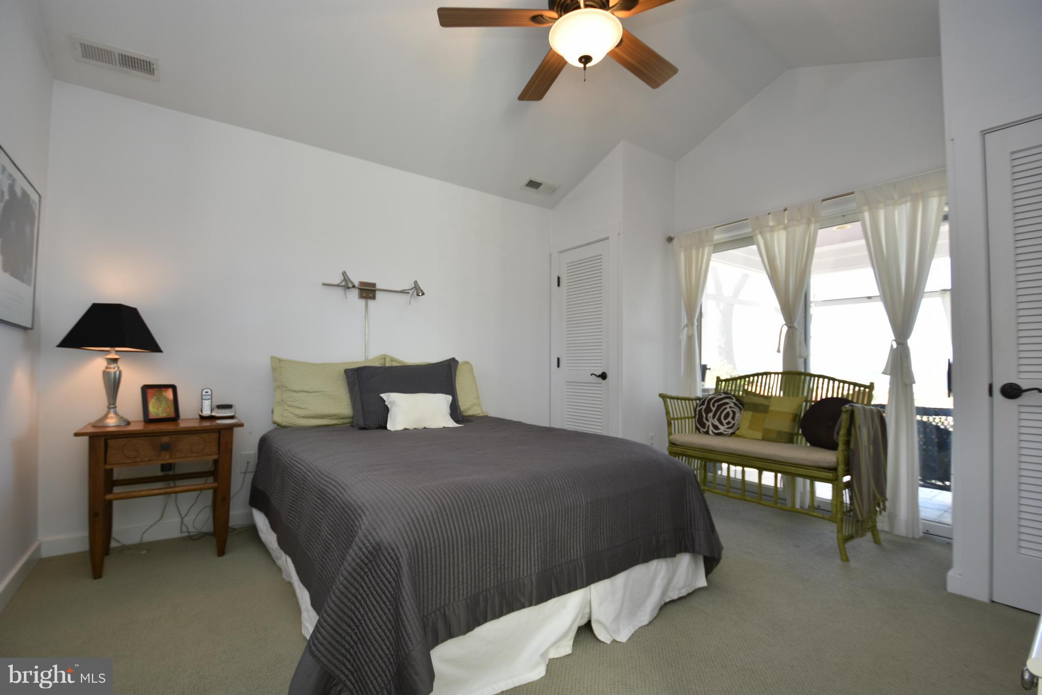 6050 Sunset Lane Tilghman, MD 21671 - Photo 31 of 74 a bedroom with a bed furniture and a window