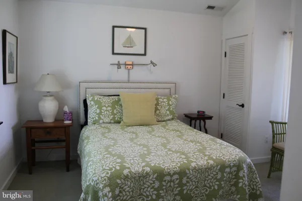 a bathroom with a shower and a toilet