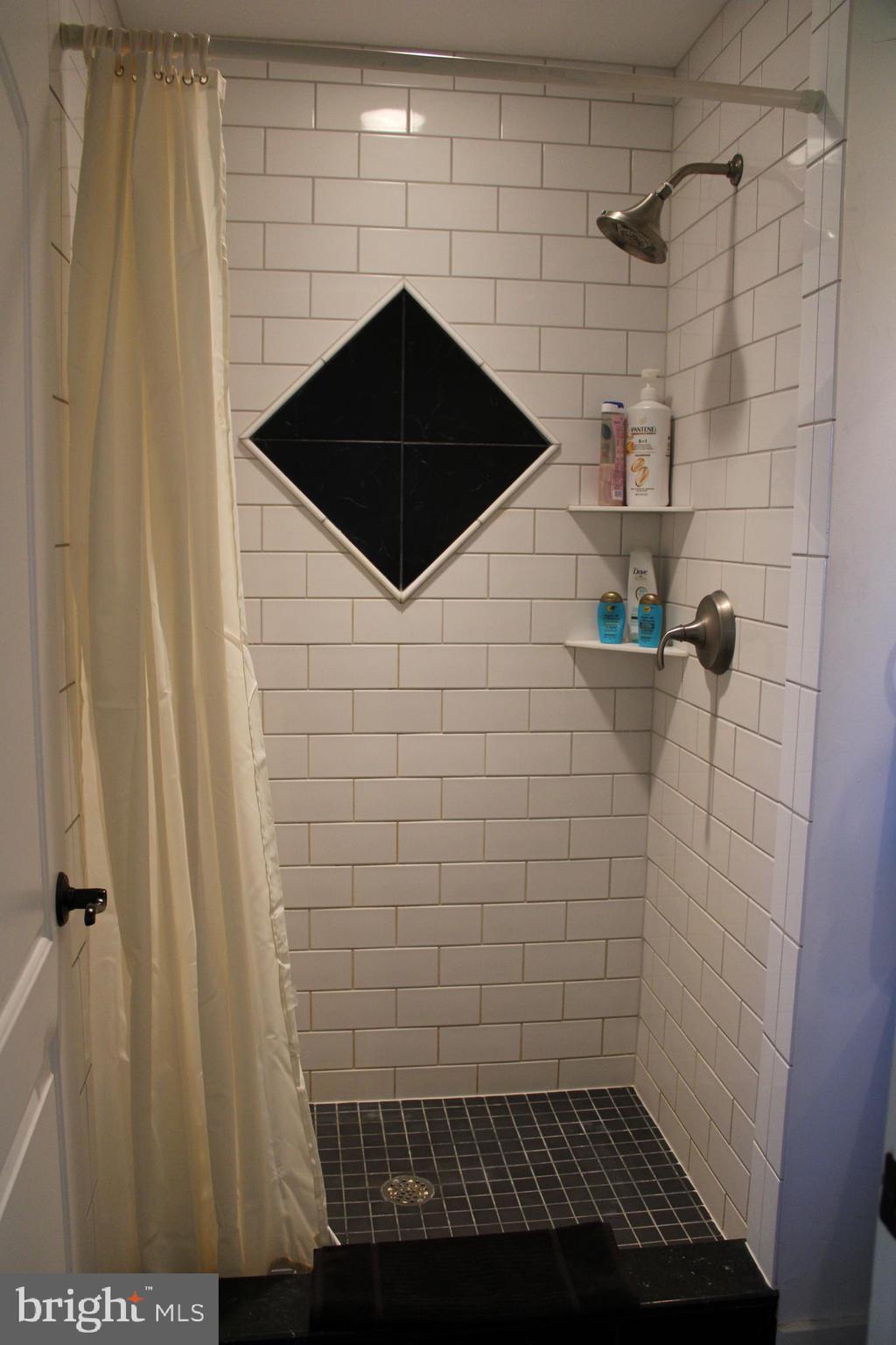 6050 Sunset Lane Tilghman, MD 21671 - Photo 42 of 74 a bathroom with a shower