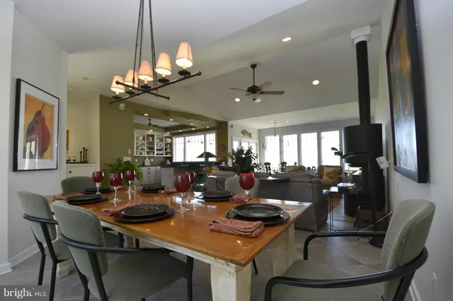 a view of a livingroom with furniture and windows