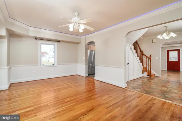 a kitchen with stainless steel appliances granite countertop a stove sink and cabinets