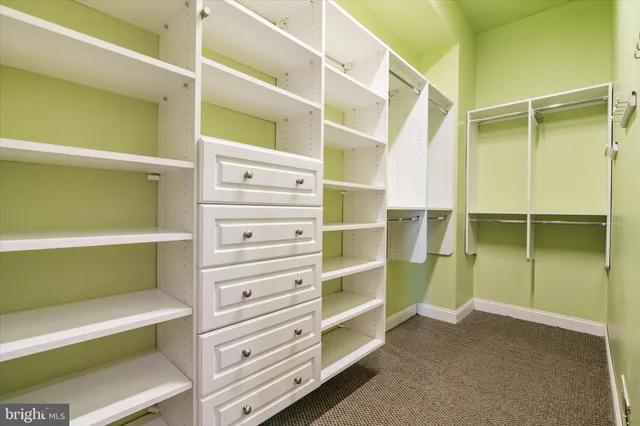 an aerial view of a houses with a lake view