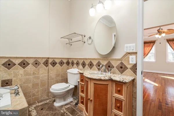 an aerial view of a houses with a lake view