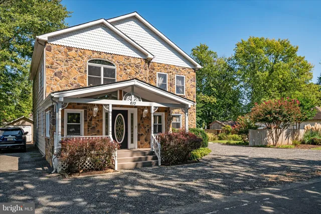 front view of a house with a small porch
