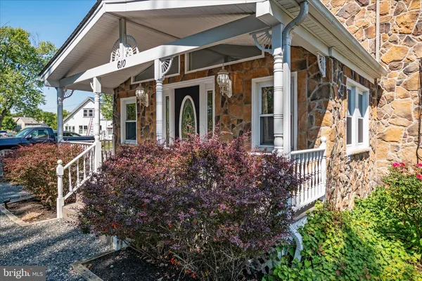 front view of a house with a small porch