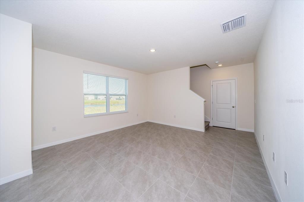 31127 Penny Surf Loop Wesley Chapel, FL 33545 - Photo 15 of 33 an empty room with windows and closet