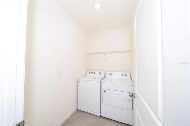 a bathroom with a granite countertop sink toilet tub and shower