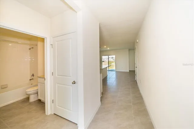 a view of a bathroom with toilet