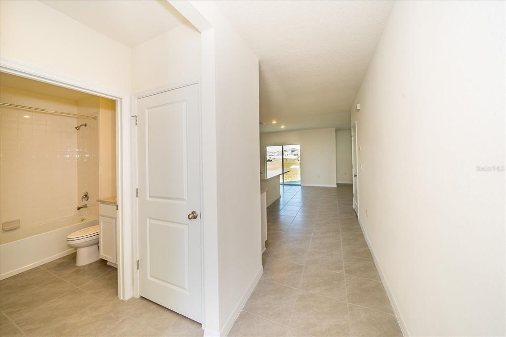 31127 Penny Surf Loop Wesley Chapel, FL 33545 - Photo 4 of 33 a view of a bathroom with toilet