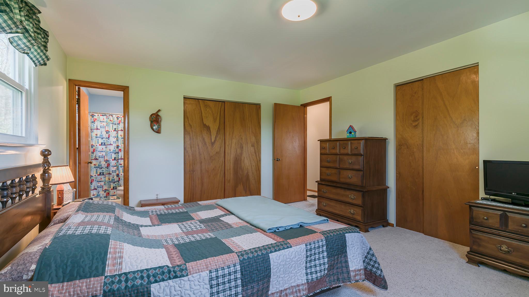 1001 Fallowfield Road Atglen, PA 19310 - Photo 14 of 34 a bedroom with a bed and furniture