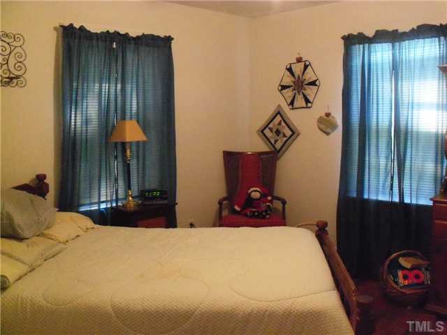 1232 Pointer Street Roxboro, NC 27573 - Photo 7 of 13 Master bedroom has adjoining half bath