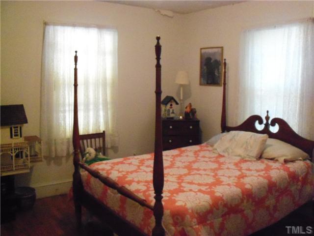 1232 Pointer Street Roxboro, NC 27573 - Photo 9 of 13 2nd bedroom with wood flooring