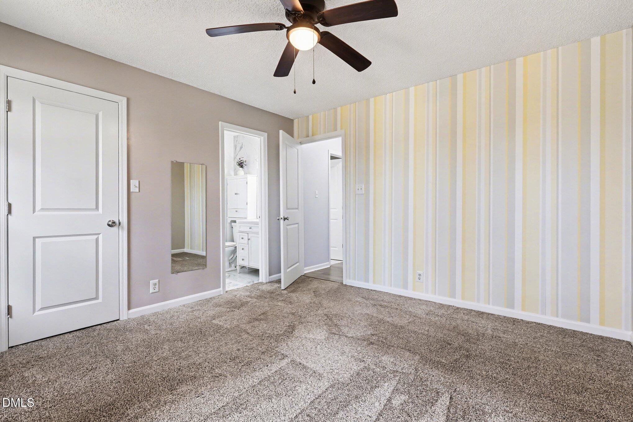 2020 Spring Valley Drive Clayton, NC 27520 - Photo 14 of 32 a view of empty room with ceiling fan