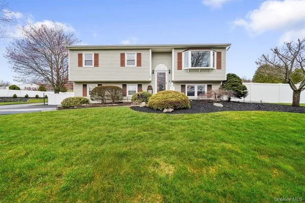 a house view with a garden space