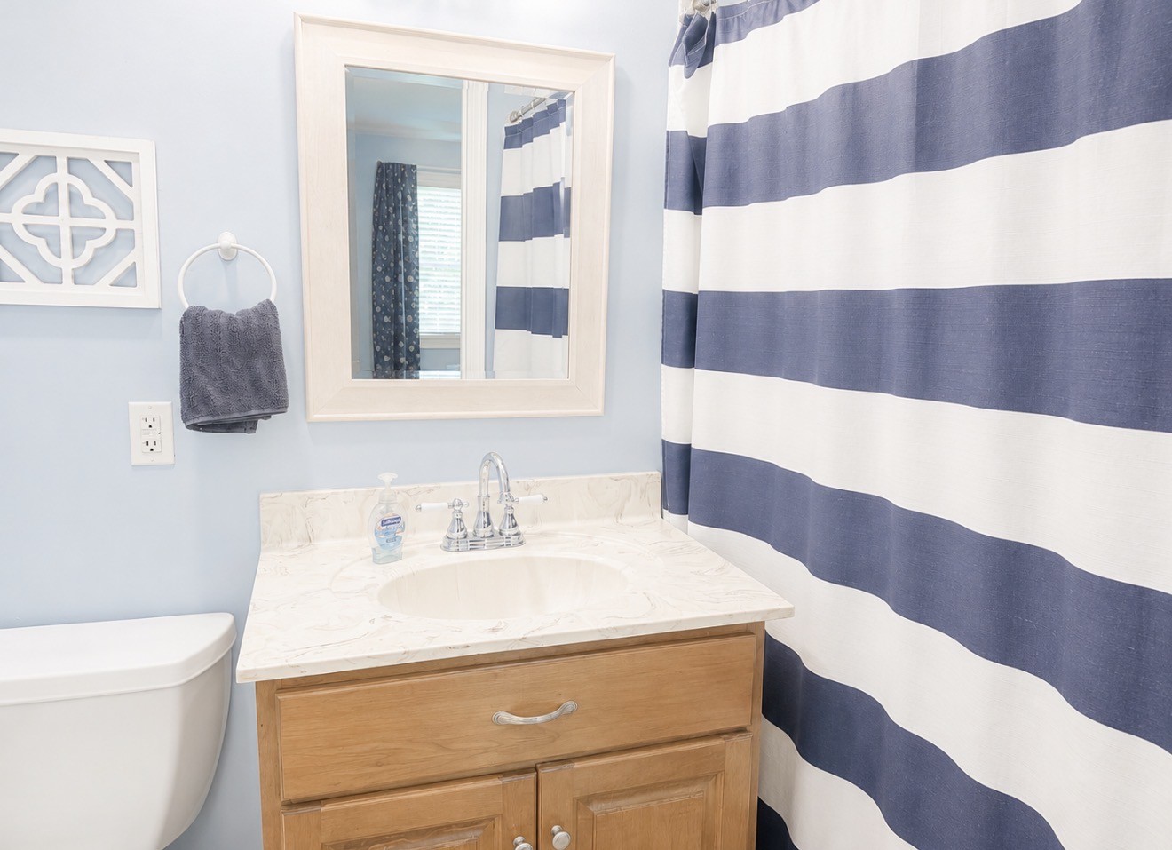 153 Henry Harris Road Westmoreland, TN 37186 - Photo 11 of 18 a bathroom with a sink and a mirror