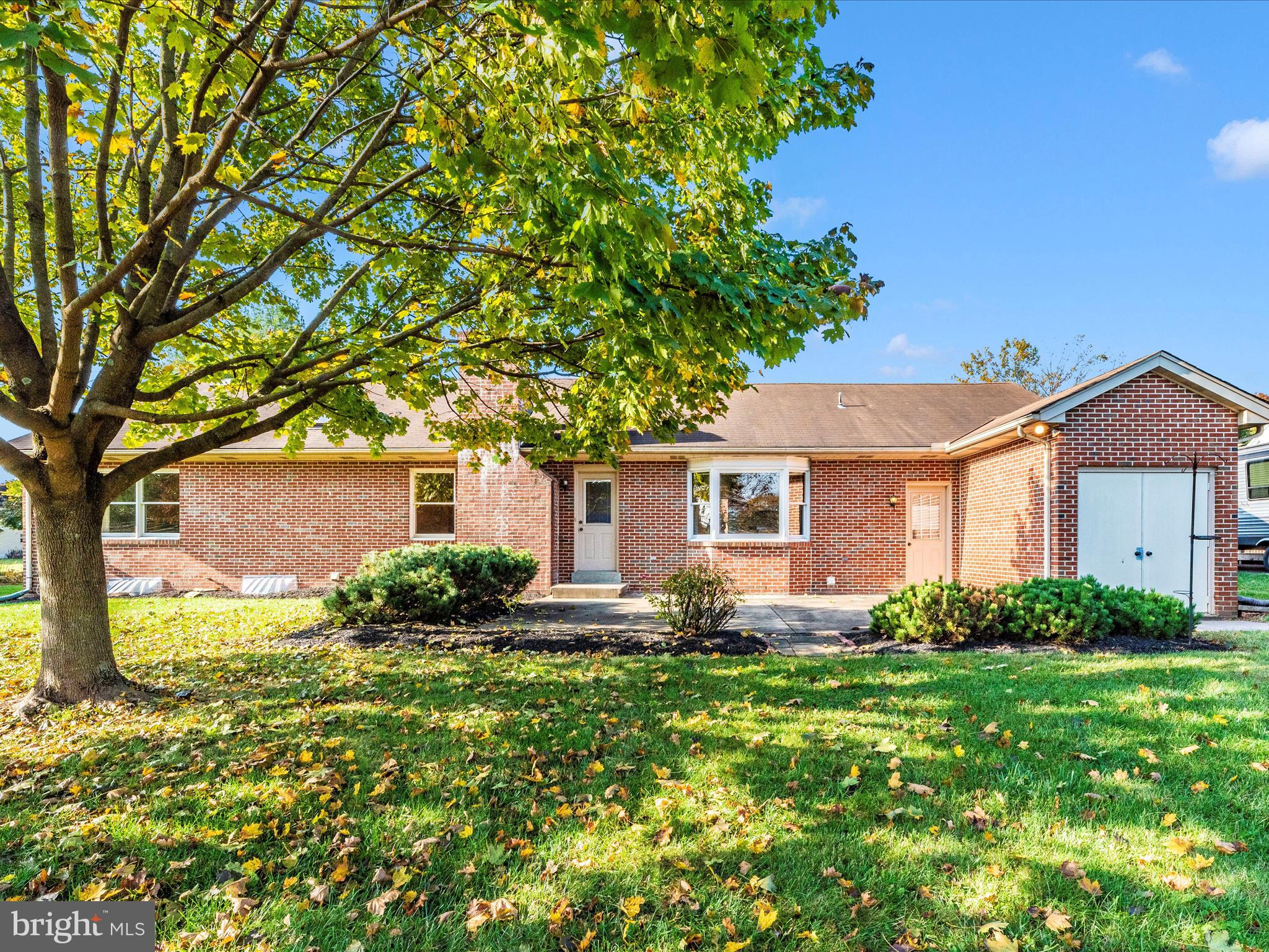 8170 Claiborne Drive Frederick, MD 21702 - Photo 43 of 70 a front view of house with yard and green space