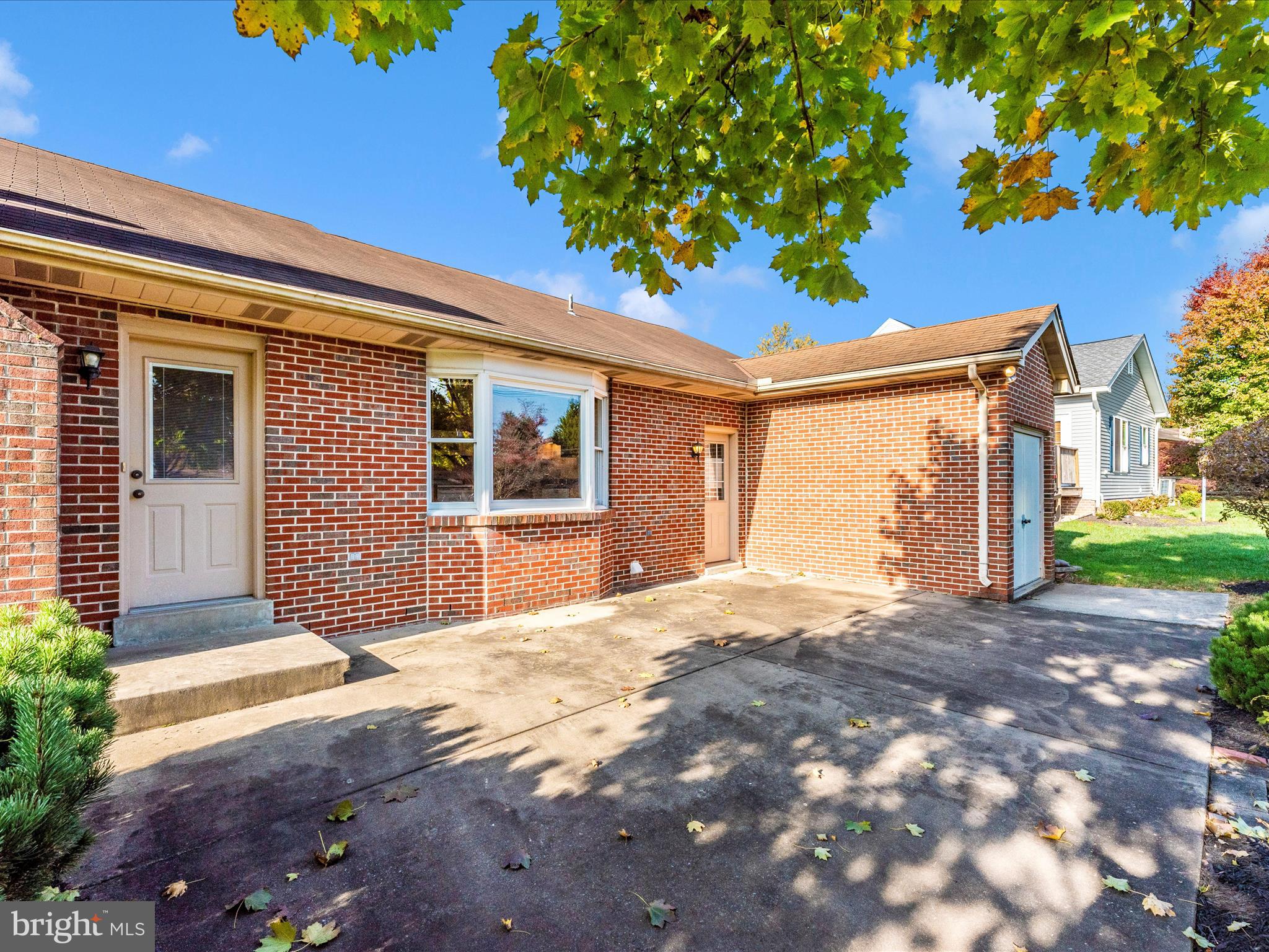 8170 Claiborne Drive Frederick, MD 21702 - Photo 45 of 70 a front view of a house with a yard and garage