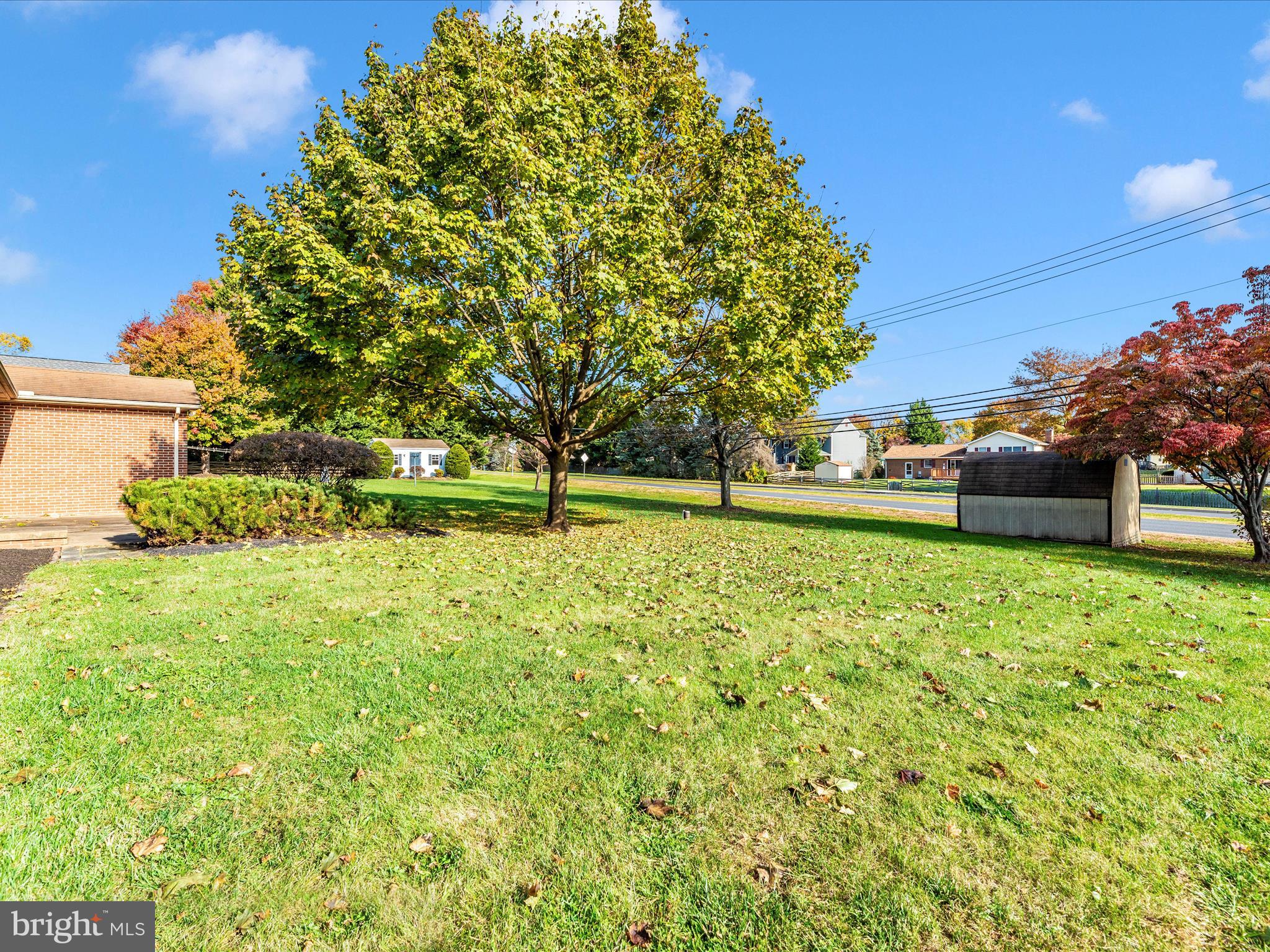 8170 Claiborne Drive Frederick, MD 21702 - Photo 50 of 70 a backyard of a house with lots of green space