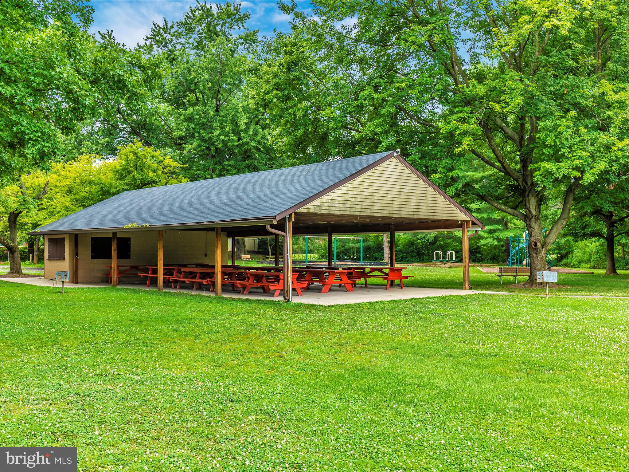8170 Claiborne Drive Frederick, MD 21702 - Photo 63 of 70 a view of a house with a big yard and large trees