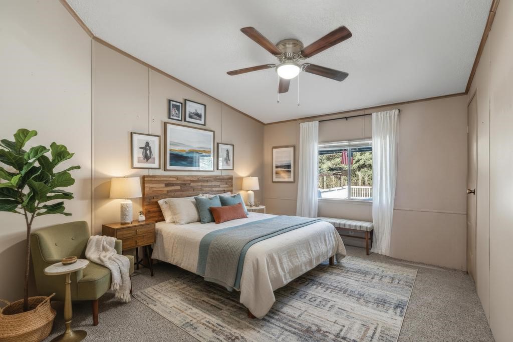 2744 Roy Sikes Road Hilliard, FL 32046 - Photo 42 of 97 a bedroom with a large bed and a chandelier