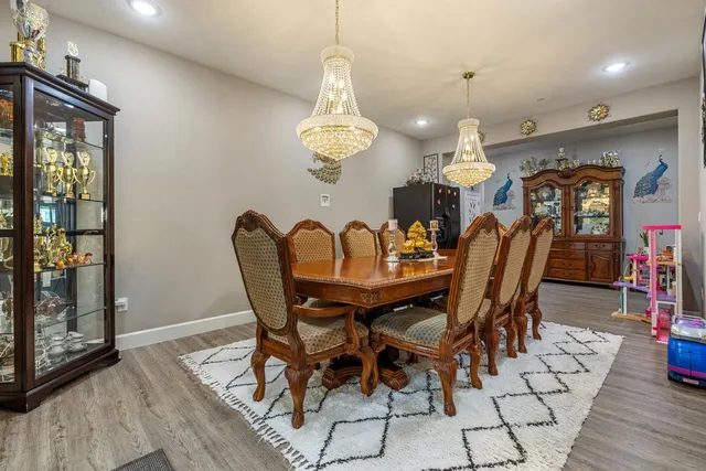 a spacious bathroom with a sink and a mirror